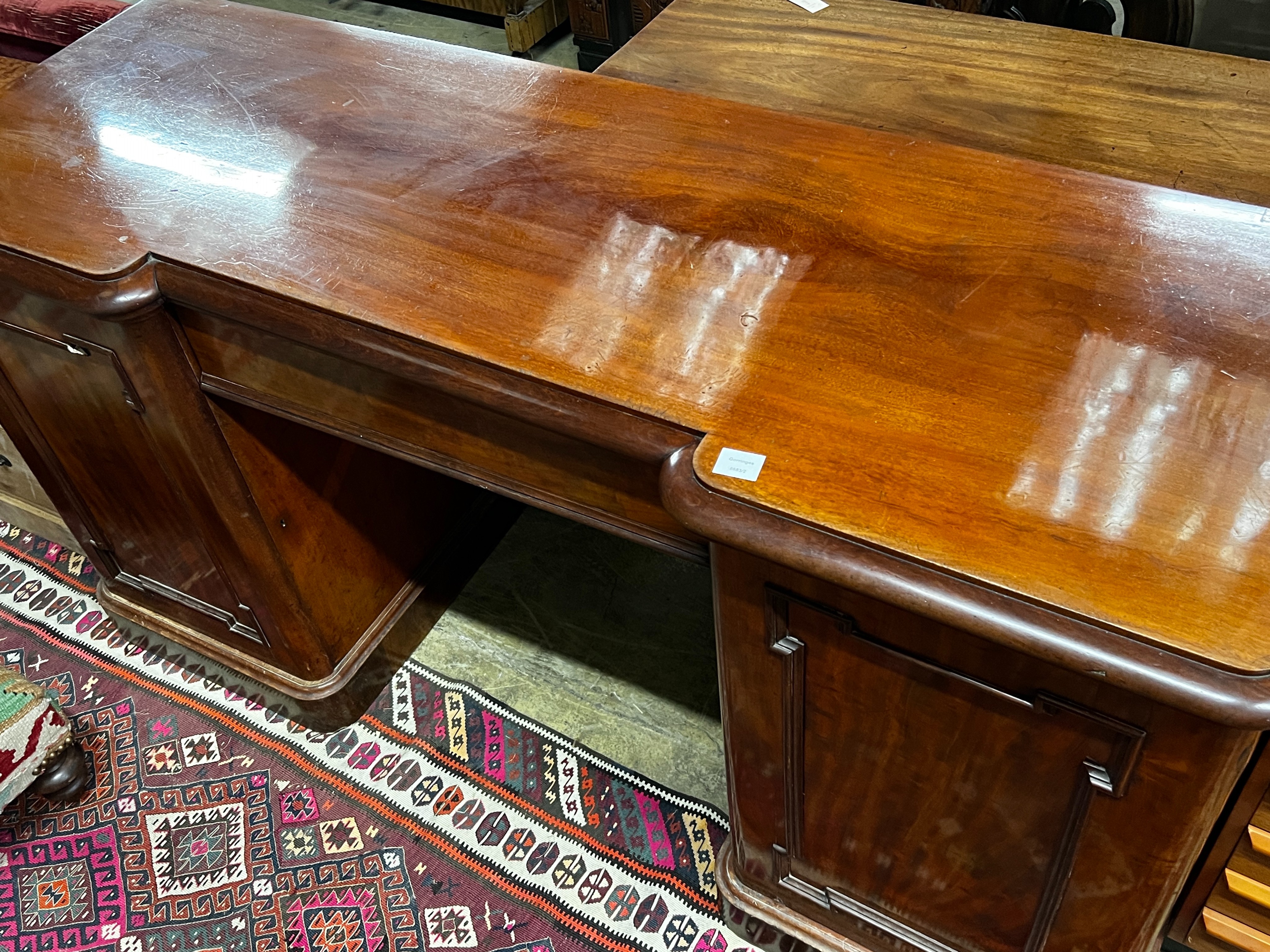 A Victorian mahogany inverse breakfront sideboard, length 180cm, depth 62cm, height 93cm